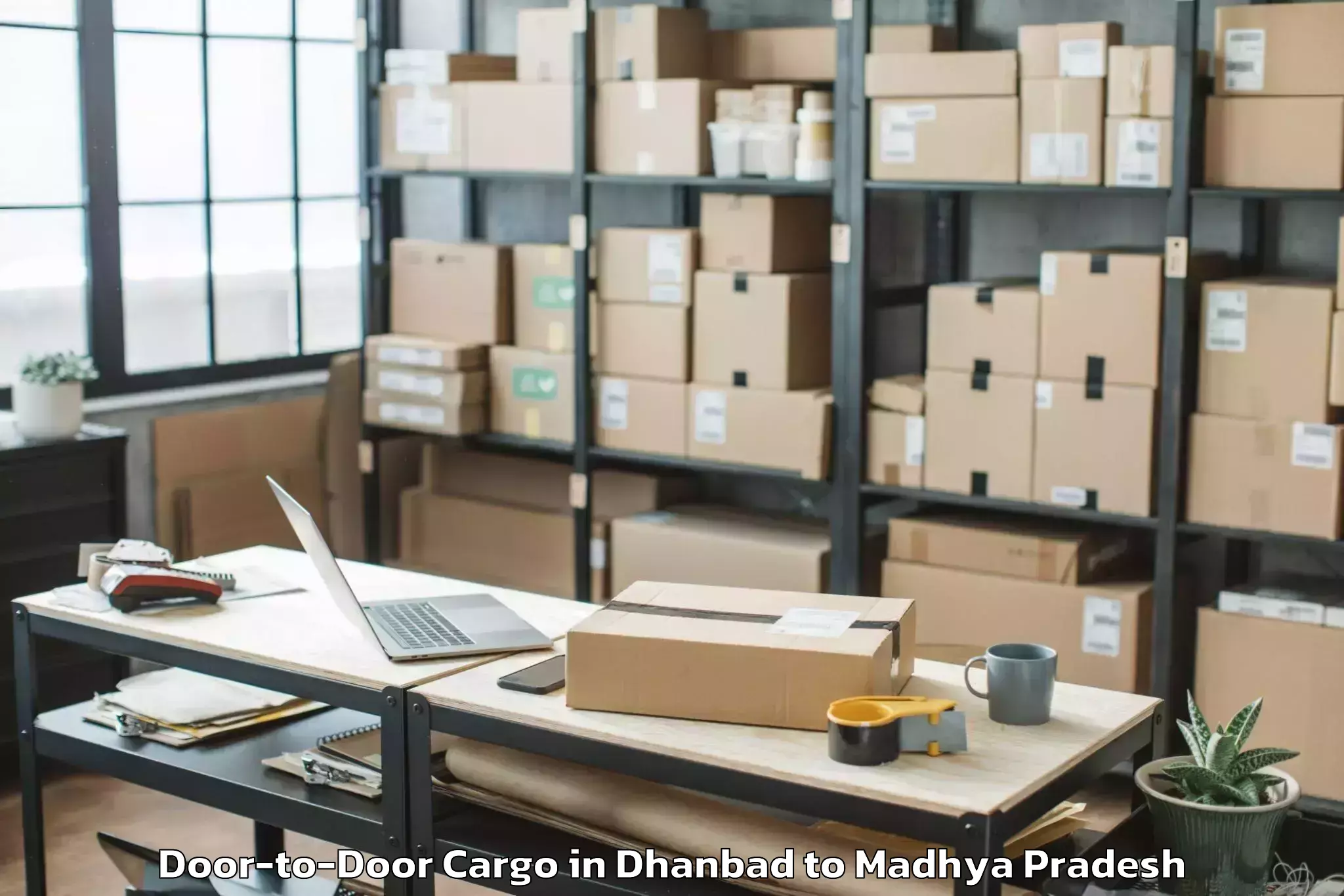 Professional Dhanbad to Jawaharlal Nehru Krishi Vishwa Door To Door Cargo